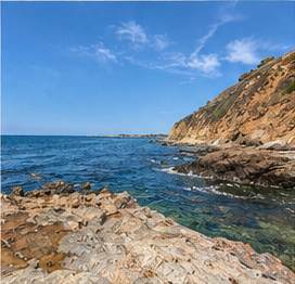 Rocky coastline and blue ocean water